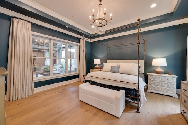 622 Stonewater Blvd, Franklin, TN 37064 - bedroom with a chandelier, wood finished floors, crown molding, recessed lighting, and baseboards