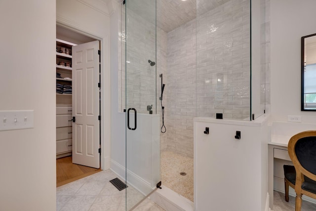622 Stonewater Blvd, Franklin, TN 37064 - full bathroom with a stall shower, a spacious closet, and tile patterned floors