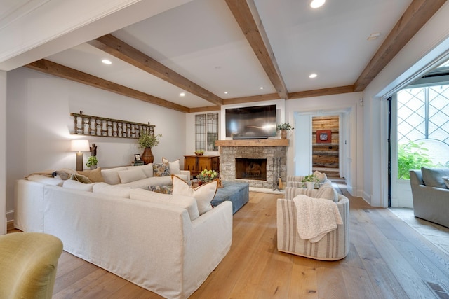 622 Stonewater Blvd, Franklin, TN 37064 - living room with beamed ceiling, light wood-style flooring, a fireplace, recessed lighting, and baseboards
