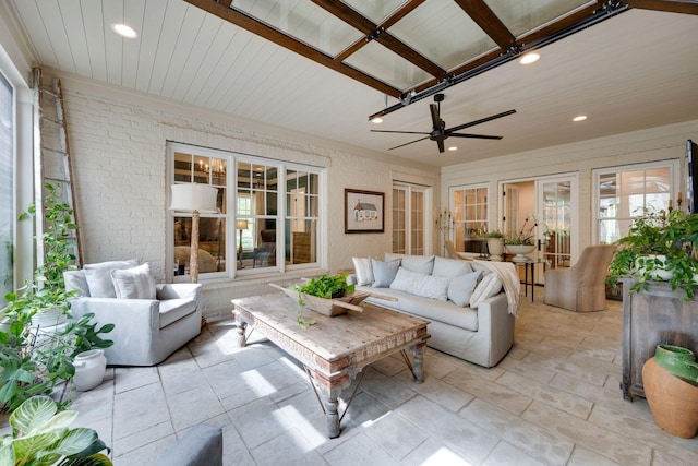 622 Stonewater Blvd, Franklin, TN 37064 - living room featuring brick wall, recessed lighting, and ceiling fan