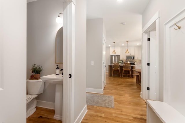 4345 S Garrett Rd, Springfield, TN 37172 - hall with light wood-style floors, baseboards, and recessed lighting