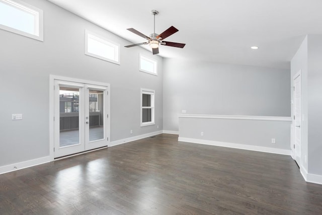 unfurnished living room with ceiling fan, baseboards, dark wood-style flooring, recessed lighting, and french doors