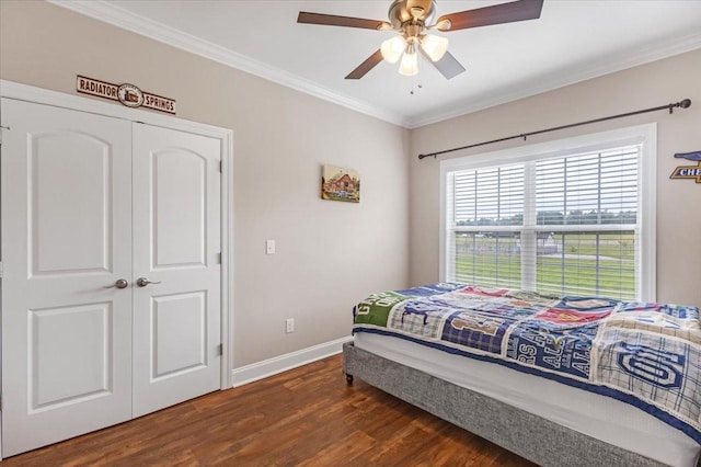 401 Hancock Ln, Tullahoma, TN 37388 - bedroom featuring wood finished floors, crown molding, baseboards, ceiling fan, and a closet