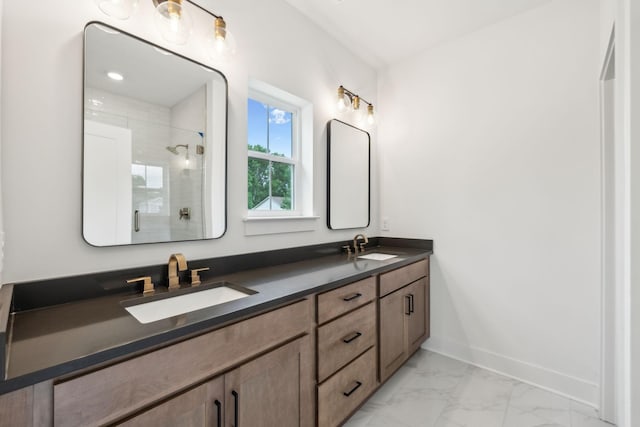 full bathroom with a shower stall, baseboards, marble finish flooring, and double vanity