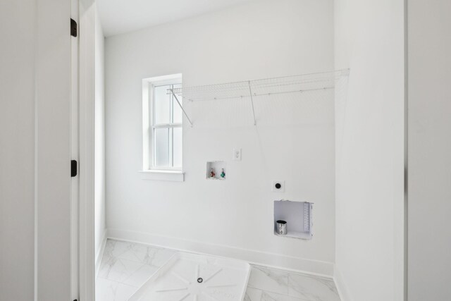 laundry area with light marble finish floors, baseboards, hookup for an electric dryer, and washer hookup