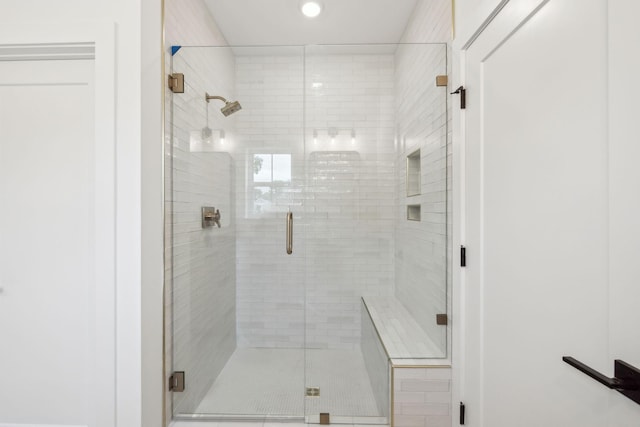 full bathroom with a stall shower and recessed lighting