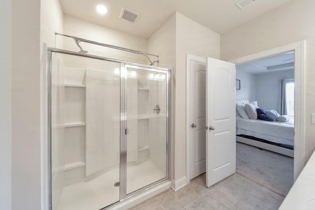4022 Arrowleaf Ln, Antioch, TN 37013 - full bathroom featuring ensuite bath, a shower stall, and tile patterned floors