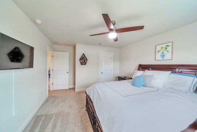 4022 Arrowleaf Ln, Antioch, TN 37013 - bedroom featuring light carpet, baseboards, and ceiling fan