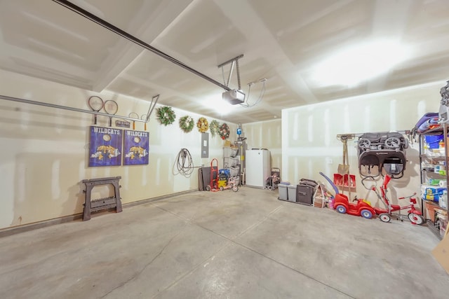 4022 Arrowleaf Ln, Antioch, TN 37013 - garage with electric panel and a garage door opener