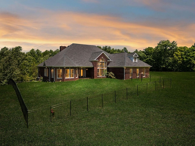 219 Dale Ln, Hilham, TN 38568 - view of front facade with brick siding and a chimney