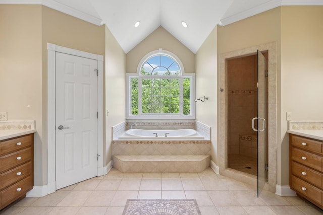 219 Dale Ln, Hilham, TN 38568 - bathroom featuring vanity, a garden tub, a shower stall, lofted ceiling, and tile patterned floors