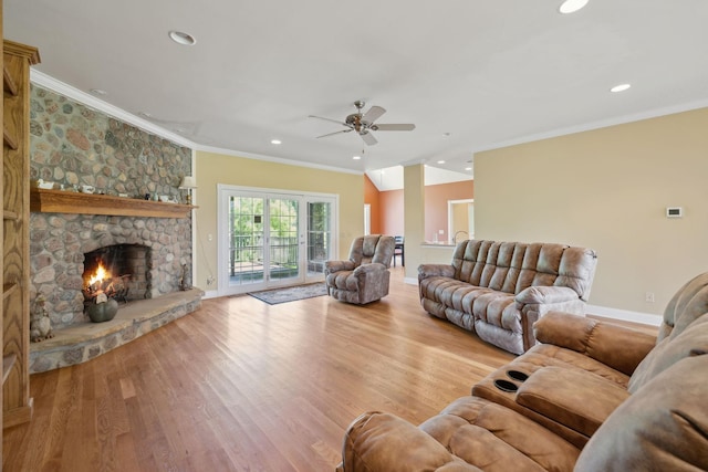 219 Dale Ln, Hilham, TN 38568 - living area with ceiling fan, recessed lighting, ornamental molding, wood finished floors, and a stone fireplace
