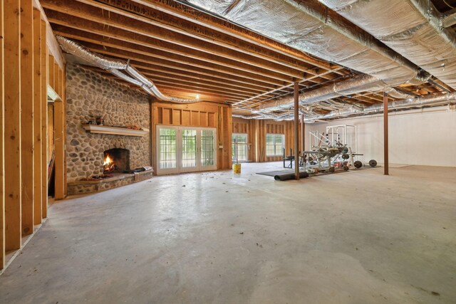 219 Dale Ln, Hilham, TN 38568 - below grade area featuring a stone fireplace