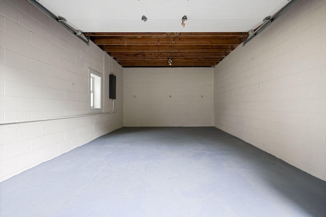 915 Taylor Cir, Burns, TN 37029 - garage featuring concrete block wall