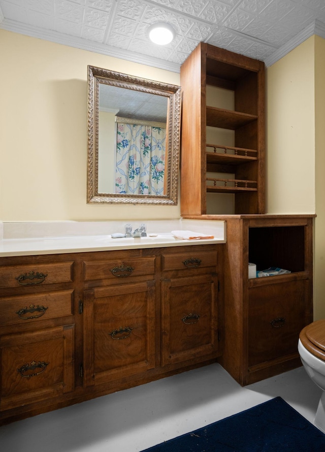 915 Taylor Cir, Burns, TN 37029 - bathroom featuring toilet, vanity, an ornate ceiling, and ornamental molding