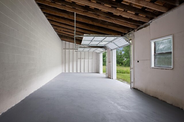 915 Taylor Cir, Burns, TN 37029 - garage with concrete block wall