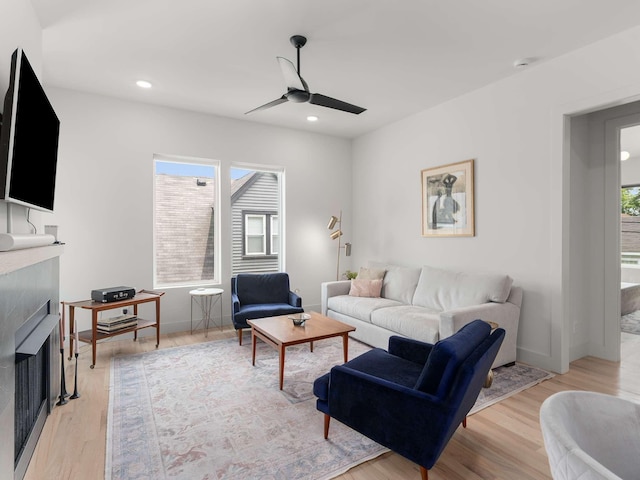 1319 Monetta Ave, Nashville, TN 37216 - living room featuring a fireplace, a ceiling fan, light wood-type flooring, and recessed lighting