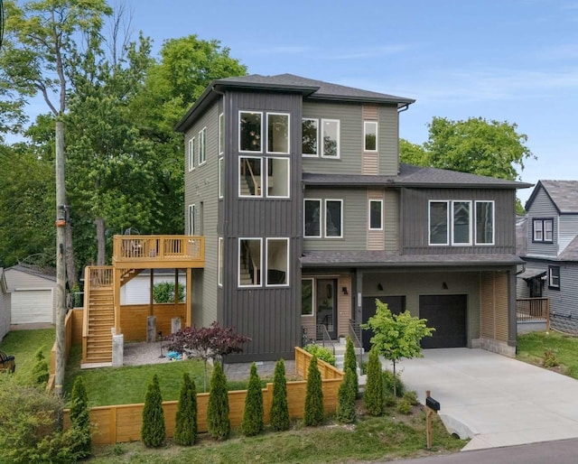 1319 Monetta Ave, Nashville, TN 37216 - contemporary house featuring stairway, driveway, fence, and an attached garage