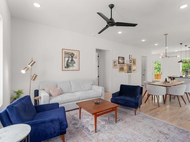 1319 Monetta Ave, Nashville, TN 37216 - living room featuring recessed lighting, light wood finished floors, ceiling fan, and a chandelier