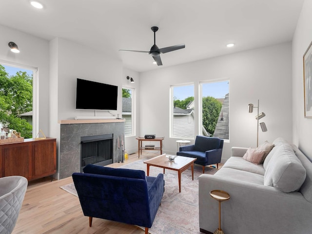 1319 Monetta Ave, Nashville, TN 37216 - living room featuring a fireplace, light wood-type flooring, ceiling fan, and recessed lighting