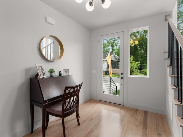 1319 Monetta Ave, Nashville, TN 37216 - doorway to outside featuring a chandelier, light wood-style floors, and stairway