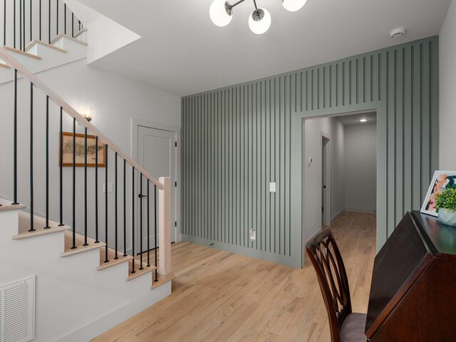 1319 Monetta Ave, Nashville, TN 37216 - stairway with wood finished floors and a chandelier
