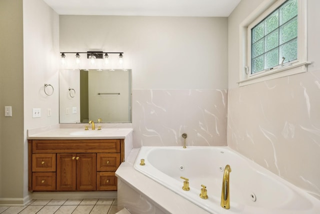 bathroom featuring vanity, a whirlpool tub, and tile patterned flooring