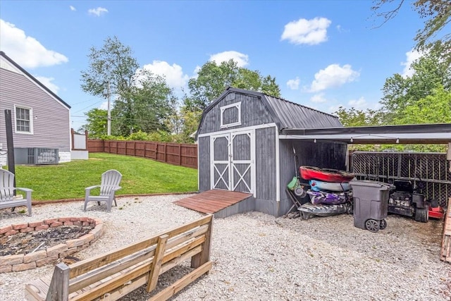view of shed featuring a fire pit and cooling unit