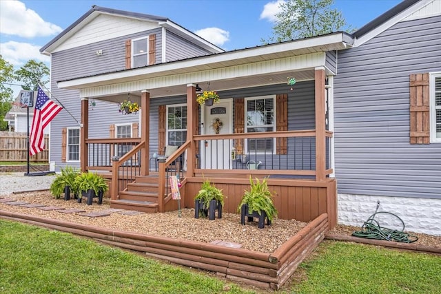 view of front of home featuring covered porch