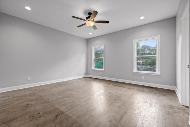 1860 Oakvale Dr, Chattanooga, TN 37421 - spare room featuring ceiling fan, wood finished floors, baseboards, and recessed lighting
