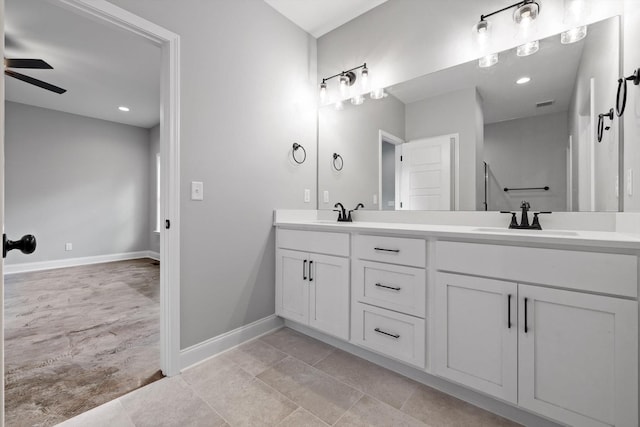 1860 Oakvale Dr, Chattanooga, TN 37421 - full bathroom featuring double vanity, baseboards, and a ceiling fan