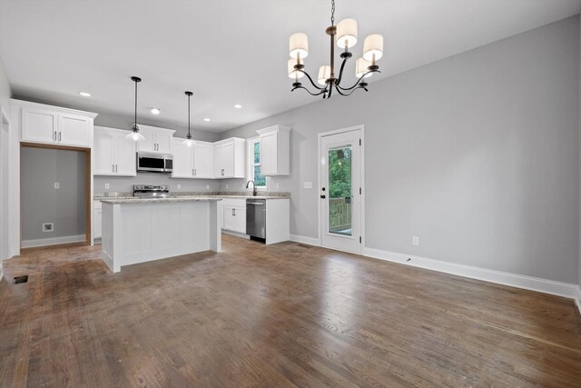 1860 Oakvale Dr, Chattanooga, TN 37421 - kitchen with stainless steel appliances, recessed lighting, a sink, baseboards, and white cabinetry