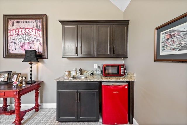3015 Prince Dr, Clarksville, TN 37043 - indoor wet bar featuring baseboards and dishwashing machine
