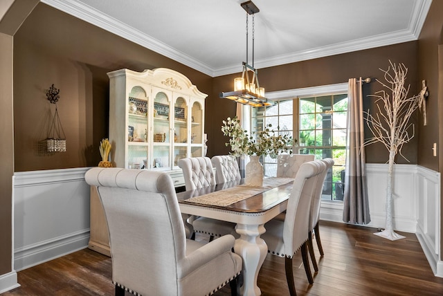 3015 Prince Dr, Clarksville, TN 37043 - dining space featuring a wainscoted wall, a chandelier, crown molding, and dark wood-style flooring