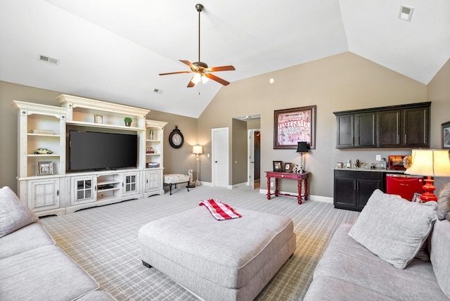3015 Prince Dr, Clarksville, TN 37043 - living room featuring lofted ceiling, baseboards, ceiling fan, and light colored carpet