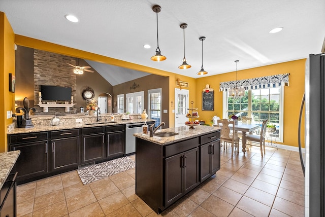 3015 Prince Dr, Clarksville, TN 37043 - kitchen with a sink, stainless steel appliances, open floor plan, ceiling fan, and recessed lighting