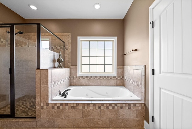 3015 Prince Dr, Clarksville, TN 37043 - bathroom featuring a shower stall, a tub with jets, and recessed lighting