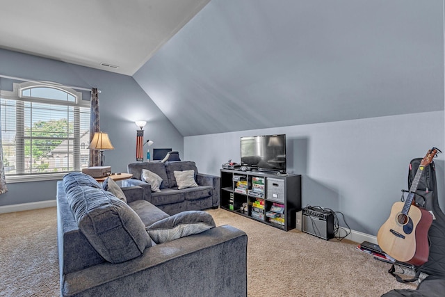 1002 Loblolly Dr, Murfreesboro, TN 37128 - carpeted living room featuring lofted ceiling and baseboards