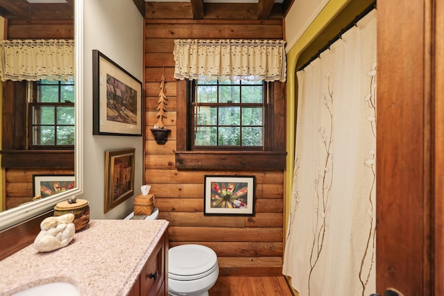 7261 Kingston Rd, Fairview, TN 37062 - bathroom with rustic walls, vanity, toilet, wood finished floors, and curtained shower