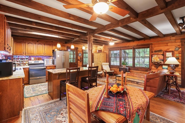 7261 Kingston Rd, Fairview, TN 37062 - dining room featuring ceiling fan, light wood-type flooring, and beam ceiling
