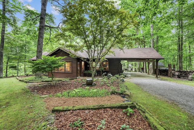 7261 Kingston Rd, Fairview, TN 37062 - log home with driveway, a carport, and log siding