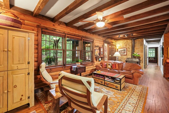 7261 Kingston Rd, Fairview, TN 37062 - living room with beam ceiling, hardwood / wood-style floors, and ceiling fan