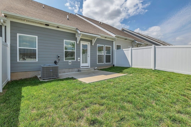 back of house featuring central air condition unit and a patio area
