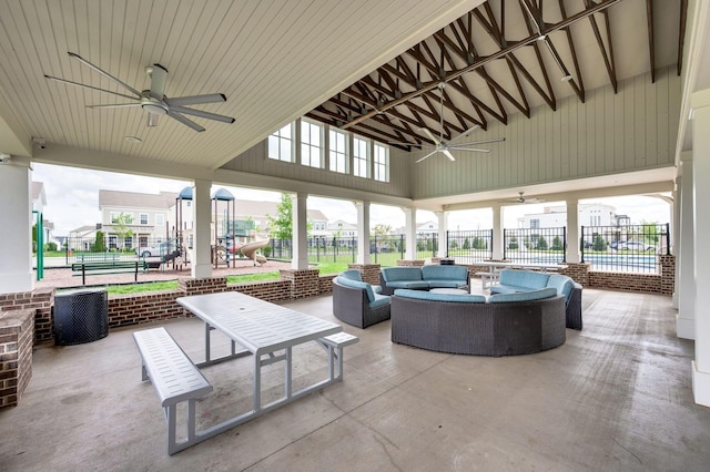 view of patio / terrace with a ceiling fan, fence, and an outdoor hangout area