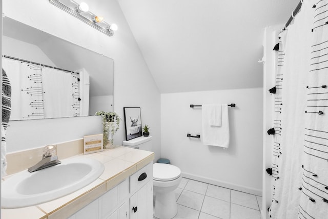 full bathroom with vaulted ceiling, tile patterned flooring, toilet, vanity, and baseboards