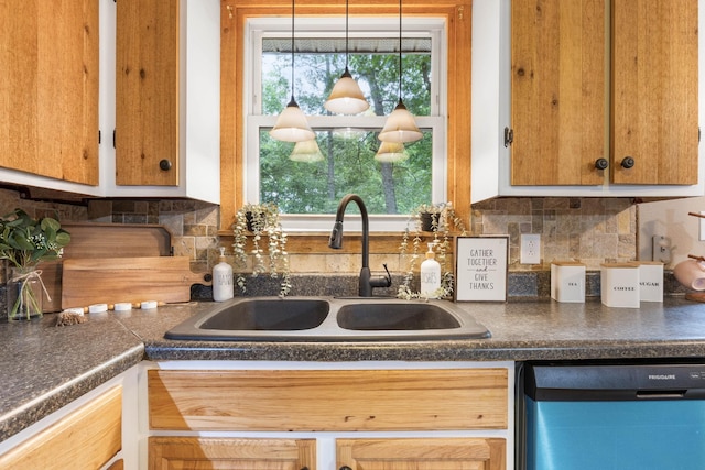 kitchen with dishwasher, a sink, dark countertops, and backsplash