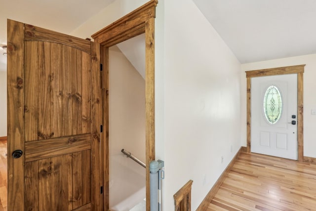 46 Seay Ln, Erin, TN 37061 - entryway featuring vaulted ceiling, light wood-style floors, and baseboards