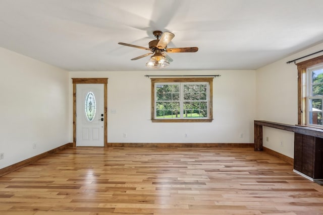46 Seay Ln, Erin, TN 37061 - foyer entrance with light wood-style floors, a ceiling fan, and baseboards