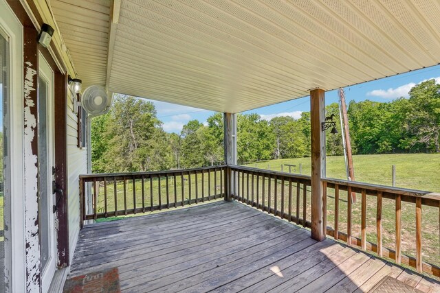 46 Seay Ln, Erin, TN 37061 - deck with view of scattered trees and a lawn