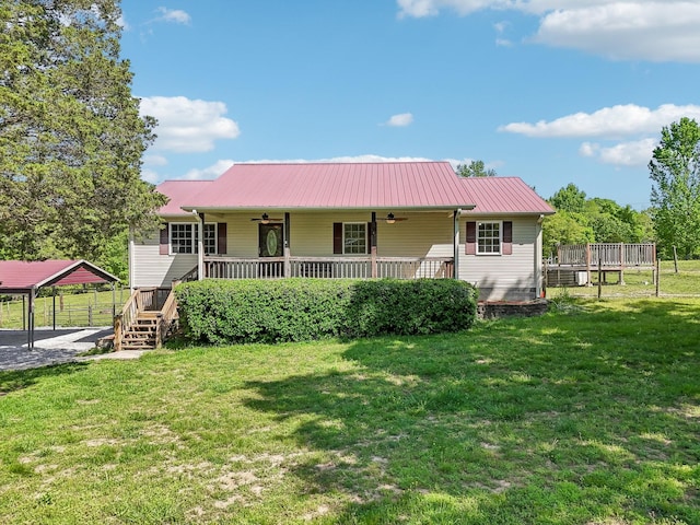 46 Seay Ln, Erin, TN 37061 - view of front of house featuring ceiling fan, metal roof, and a detached carport